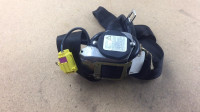 Seat belt with tensioner