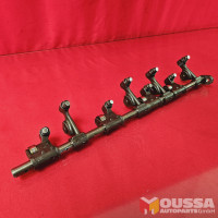 Exhaust outlet roller rocker arms