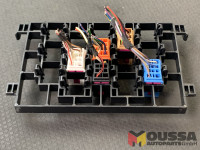 Fuse box connector strip carrier